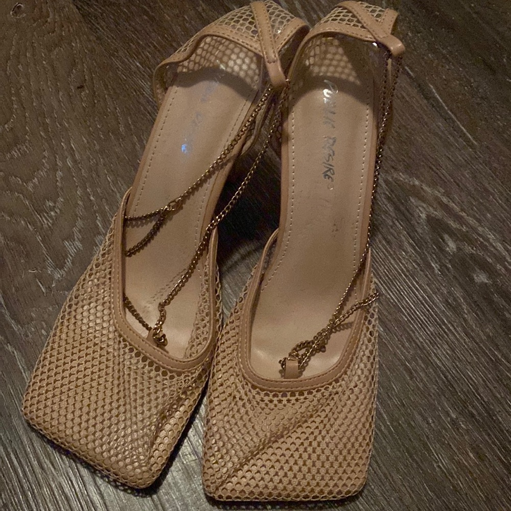 Beige fishnet high heels
